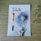 tarjeta con vela alcanzando estrellas