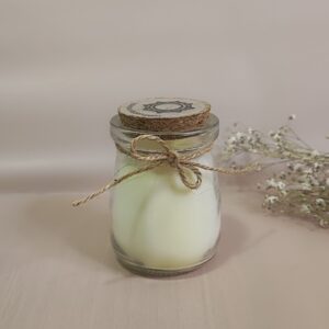vela aromática con tapa de corcho